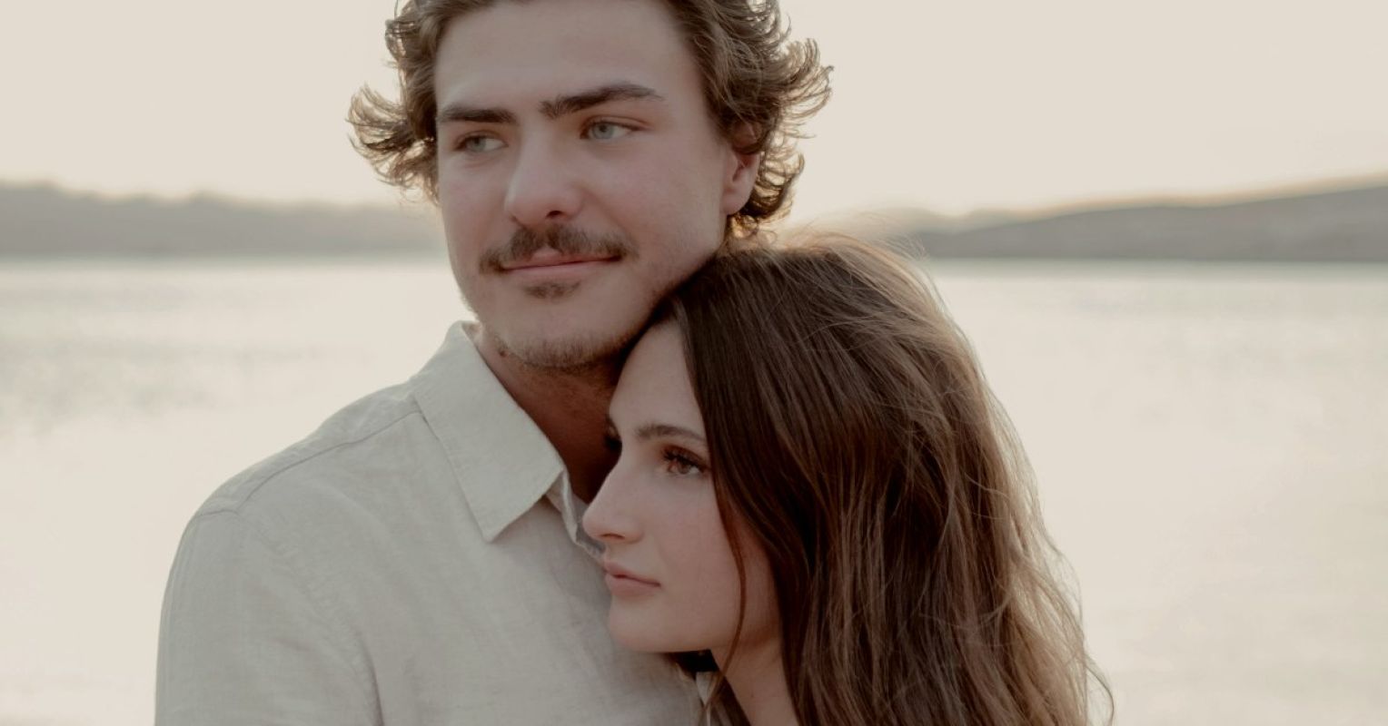 2 Tough Marriage Lessons Every Couple Has to Learn 1 a married man and a woman hugging by the water during daytime 4x3 1