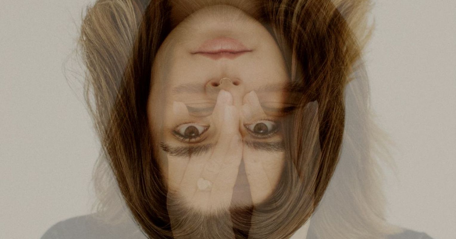 One Key to Happiness That's Often Overlooked 1 a portrait photograph shows a woman with double exposure by frank flores 4x3 1
